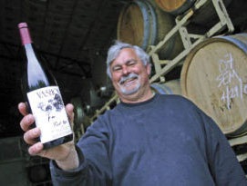 Vashon Winery owner Ron Irvine shows off his Pinot Noir on Vashon Island in Washington's Puget Sound